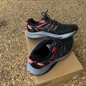 Pink and black sneakers